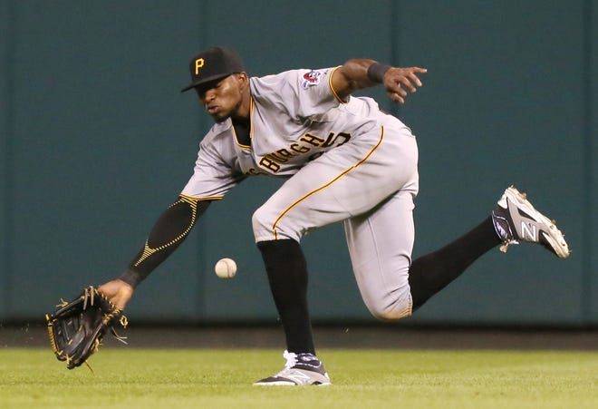 Pittsburgh Pirates right fielder Gregory Polanco is unable to field an RBI triple off the bat of the St. Louis Cardinals' Yadier Molina in the sixth inning on Wednesday, Aug. 12, 2015, at Busch Stadium in St. Louis, Mo. [Chris Lee/St. Louis Post-Dispatch/TNS]