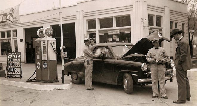Back in the 1950s, it was common to see all employees wear uniforms and bow ties at your local gas station. This Gulf station photo shows the attendants taking care of an early 1950s style Studebaker and making recommendations to the owner. [Compliments Gulf Oil]