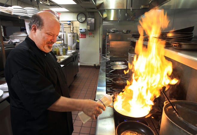 Jerry Simonetti in the kitchen inside Lily's Bistro at its new location at 4547 suite 104 Charlotte Highway in Lake Wylie, South Carolina. [JOHN CLARK/THEGASTON GAZETTE]