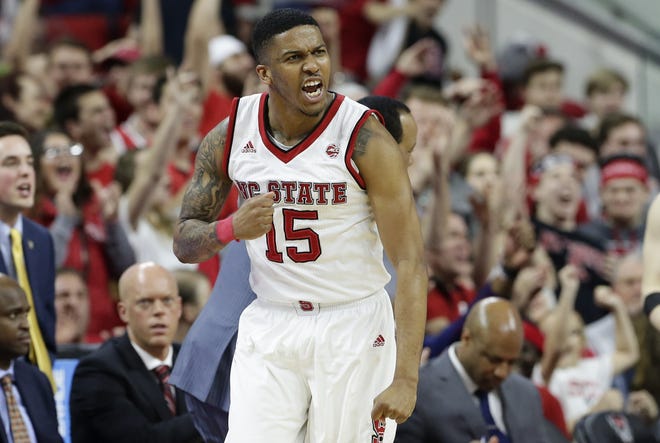 N.C. State's Sam Hunt, who is playing in his first ACC tournament after transferring from N.C. Central, says, 'It’s the best feeling in the world.' [GERRY BROOME/AP FILE PHOTO]