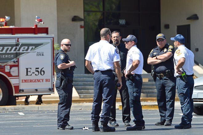 Police and firefighters from Leesburg, Lake County and Sumter County responded to reports of a suspicious substance on Wednesda at the Social Security Administration office in Leesburg. [Whitney Lehnecker/Daily Commercial]