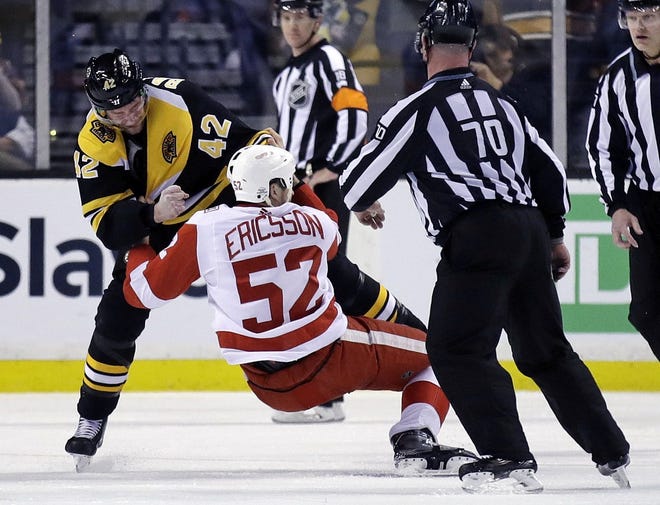 Bruins forward David Backes (42), shown fighting Red Wings defenseman Jonathan Ericsson on Tuesday night, was suspended three games on Wednesday for a hit he delivered during Boston's 5-4 win over Detroit.