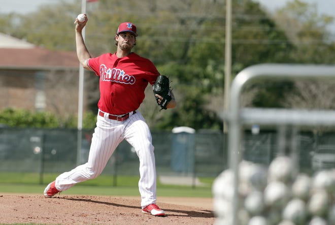 Philadelphia Phillies starting pitcher Aaron Nola throws during batting practice at baseball spring training camp in February in Clearwater, Fla. Nola is the undisputed ace on a pitching staff that has plenty of potential but lacks proven talent. [AP Photo/Lynne Sladky]