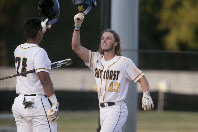 Gulf Coast's Cory Heffron celebrates his first-inning home run against Pensacola State on Wednesday with on-deck hitter Alec Aleywine (28). [JOSHUA BOUCHER/THE NEWS HERALD]