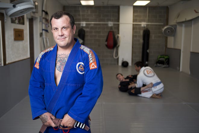 Thor Shafer, owner of Rilion Gracie Brazilian Jiu Jitsu, at his studio on Monday in Panama City Beach. He recently won national competitions in Canada and the United States and is one of the top ranked Jiu Jitsu martial artists in North America. [JOSHUA BOUCHER/THE NEWS HERALD]