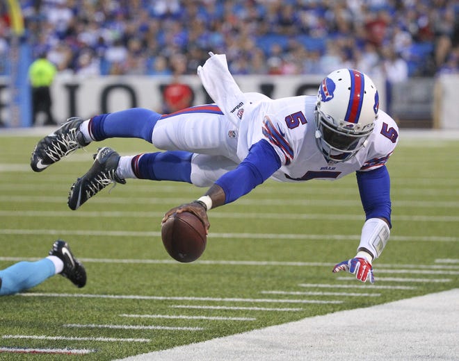 In this Aug. 15, 2015 file photo, Buffalo Bills quarterback Tyrod Taylor (5) dives for the first down marker during the first half of an NFL preseason football game against the Carolina Panthers in Orchard Park. [AP Photo/Bill Wippert]