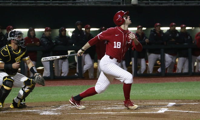 Alabama outfielder Keith Holcombe makes contact during the Crimson Tide's game against the Southern Miss Golden Eagles at Sewell-Thomas Stadium on Wednesday. Alabama hosts a three-game series with New Mexico State, starting with a doubleheader today. [Photo/ Jake Arthur]