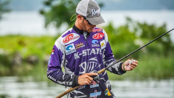 Kansas State's Travis Blenn adjusts his bait while fishing against fellow Wildcat angler Kyle Alsop during the 2017 FLW College Fish-off at Wilson Lake following their YETI FLW College Fishing National Championship win on Alabama’s Lake Wheeler. Blenn and other college anglers in Kansas will have a chance to compete in their home state for a shot at an entry in the 2019 Bassmaster Classic during the Bassmaster College Series Classic Bracket at Milford Lake. [Photo courtesy of FLW]