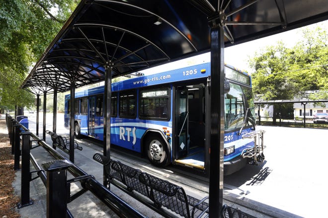 The RTS bus shelter is shown along SW 20th Avenue near the 3500 block in this file photo. On Monday, the city is expected to announce a cutback on some Regional Transit System services due to a shortage of bus drivers. [File]