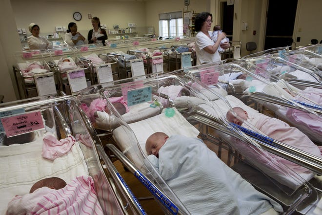 Fewer expectant parents are saying they prefer to have a son over a daughter, a new survey shows, perhaps because American women over the past few decades are more likely to be college graduates, pursue rewarding careers and have a greater role in family decision-making. These baby girls were born at a Monroe, New York, hospital. [The New York Times file photo]