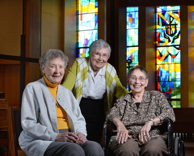 Sister of Mercy Rita Brocke, 91, left; Sister of St. Joseph Mary Claire Kennedy, 89, center; and Erie Benedictine Sister Marlene Bertke, 86, will be honored at a special event Sunday for their years of dedicated social activism in the Erie region. They are shown in the chapel at Mount St. Benedict Monastery, where the 2 p.m. public program will be held. [CHRISTOPHER MILLETTE/ERIE TIMES-NEWS]