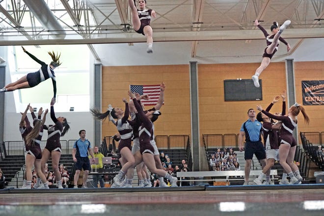 Three teams compete side-by-side during the RILL Cheer State Championships at Providence Career & Technical Academy on Saturday. La Salle Academy took top honors as the overall champion. The Rams also won the Co-ed Division. Winning the Large Division was Tolman, with Tiverton earning the Small Division title. [The Providence Journal / Sandor Bodo]