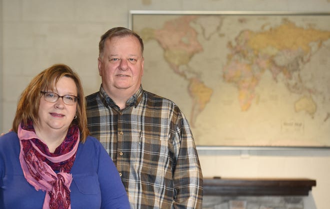Kent couple Tom and Cheryl Poulin recently gained American citizenship after 14 years in the U.S.