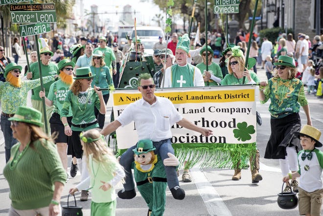 St. Augustine's annual St. Patrick's Day Parade heads through downtown on Cathedral Place on Saturday. [CHRISTINA KELSO/THE RECORD]