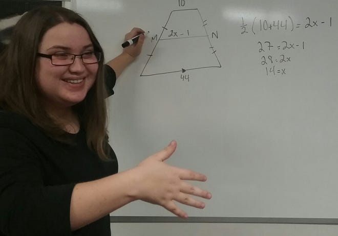 Chasity McCraw shows how she approaches math as a "giant puzzle." [Special to The Star]