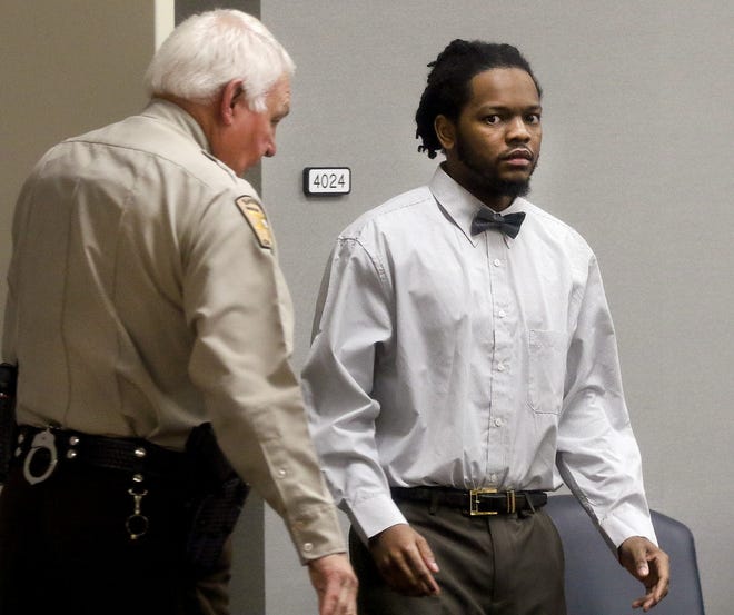 Naijii Boyd enters the courtroom during the jury selection phase of his first degree murder trial at the Gaston County Courthouse Monday morning. [JOHN CLARK/THE GAZETTE]