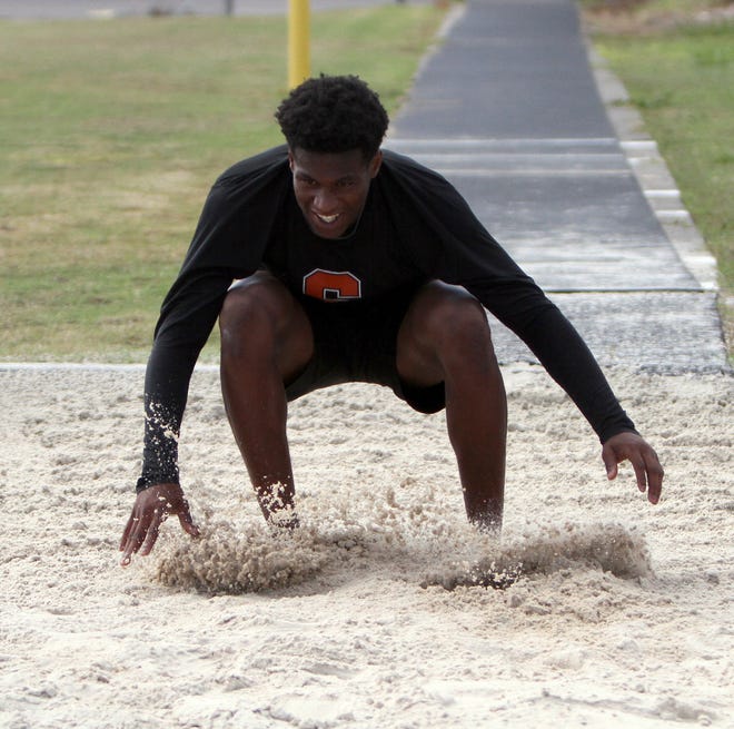Charles Ward of Sarasota High practices the long jump. After the his first meet of the season, he owns the best mark in the state with a leap of 23 feet, 4 3/4 inches. [HERALD-TRIBUNE STAFF PHOTO / DENNIS MAFFEZZOLI]