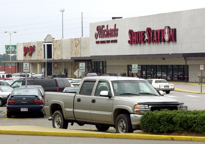 Shoe Station, seen here at its former McFarland Mall location in 2002, is returning to Tuscaloosa this summer. It will join its former McFarland Mall neighbor's like Michael's and T.J. Maxx in the McFarland Plaza in early July, company officials said. [Staff file photo / Porfirio Solorzano]