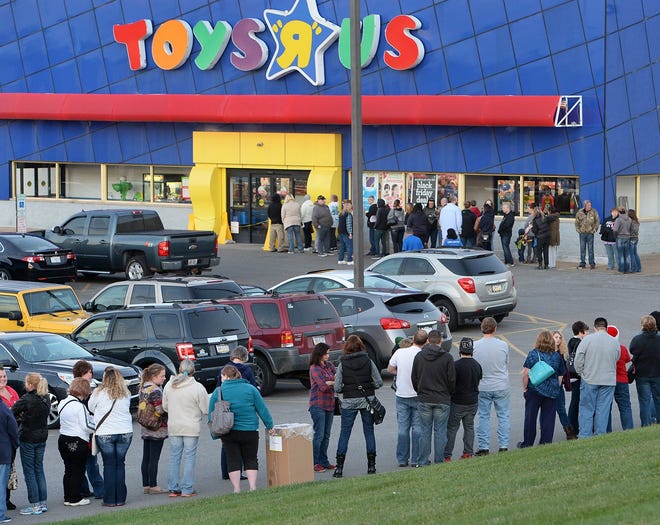 Shoppers wait in line Thanksgiving evening 2015 at Toys R Us in Millcreek Township. The Erie location, as well as all of the chain's other stores, are expected to be sold or close. [GREG WOHLFORD/ERIE TIMES-NEWS FILE PHOTO]