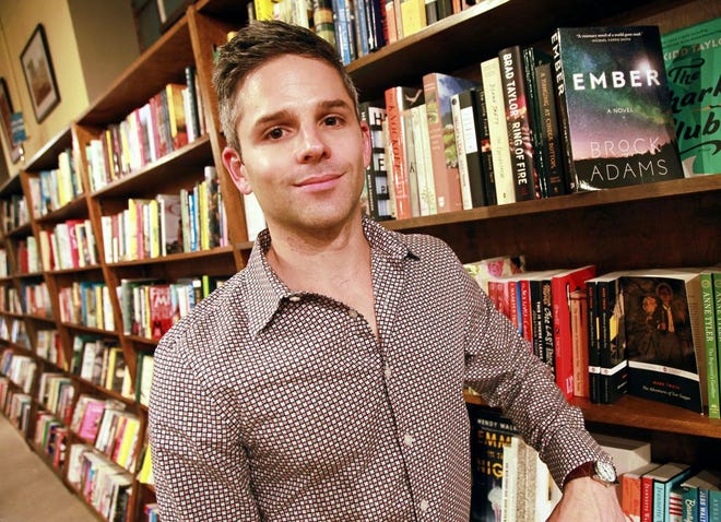 Author Brock Adams signed copies and read from his new book Ember on August 31, 2017 at the Hub City Bookshop. [LELAND A. OUTZ/ for the Spartanburg Herald-Journal]
