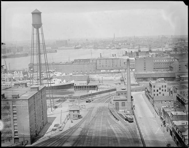 Here is a view from East Boston grain elevator looking towards Charlestown. Learn more from Digital Commonwealth at www.digitalcommonwealth.org.