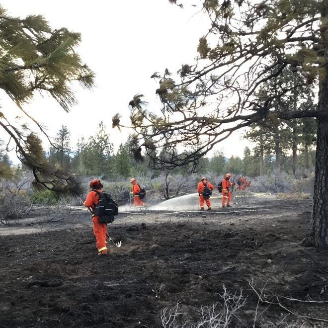 Dry conditions made mopping the Ordway Fire a group effort March 12, 2018 near Lake Shastina.