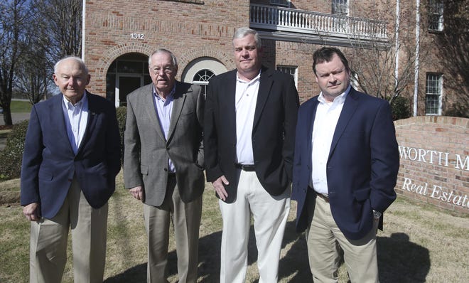 John Duckworth, Joe Duckworth Sr., Joe Duckworth Jr. and Warner Johnson stand in front of Duckworth Morris Real Estate located on Greensboro Avenue in downtown Tuscaloosa on March 8. The business is celebrating 100 years of service in the Tuscaloosa area. [Staff Photo/Erin Nelson]