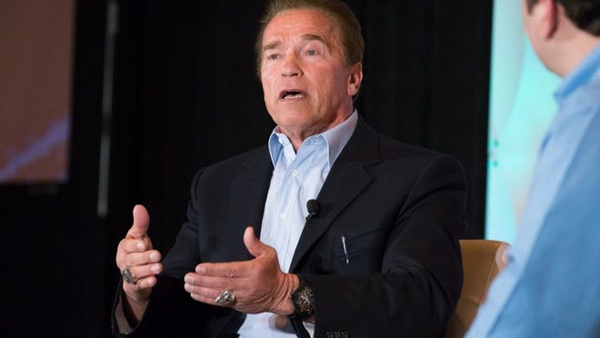 Arnold Schwarzenegger speaks during SXSW at the Hilton in Austin.