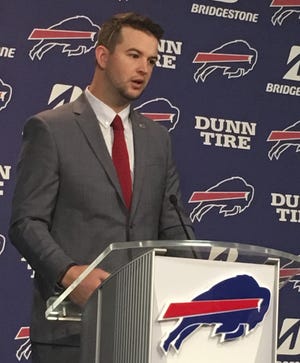 Quarterback A.J. McCarron speaks to the media after his arrival at Buffalo Bills headquarters in Orchard Park, N.Y., on Thursday, a day after agreeing to a two-year contract in the opening hours of the NFL's free-agency period. [AP Photo/John Wawrow]