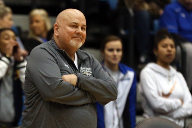 Barton coach Craig Fletchall reacts to a call during the semifinal game of the Region 6 tournament Tuesday, Mar. 6, 2018 Hartman Arena. [Travis Morisse/HutchNews]