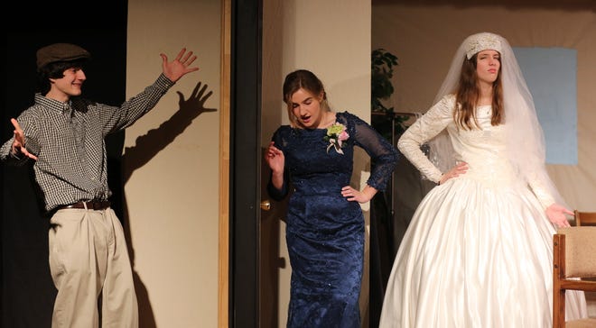 Barney Bouy, played by Hayden Carpenter, sings for Carolyn Compton and bride Millie, played by Morgan Gardner and Natalie McCabe in Burns High Theatre Troup's “Here Comes The Bride And There Goes The Groom!” [Brittany Randolph/The Star]