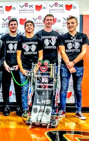 Members of Loudonville High Robotics Team 598B, from left, Reed Bahr, Jarryd Baynes, Dillon Portz and Nick Ramey, pose with their robot at the Vex Robotics State Championship tournament at Columbus East High School on Saturday, March 10. The Loudonville team, all seniors, placed as runner-up against a field of 74 teams.