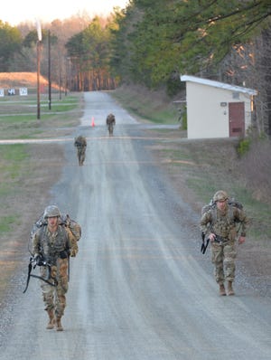 Soldiers participate in a 12-mile ruck march during the North Carolina National Guard's Best Warrior Competition at the Camp Butner National Guard Training Center March 2-5. [Sgt. Odaliska Almonte/North Carolina National Guard]