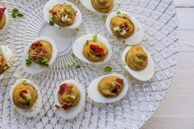 Deviled eggs from a recipe by Katie Workman. (Carrie Crowder/Katie Workman via AP)