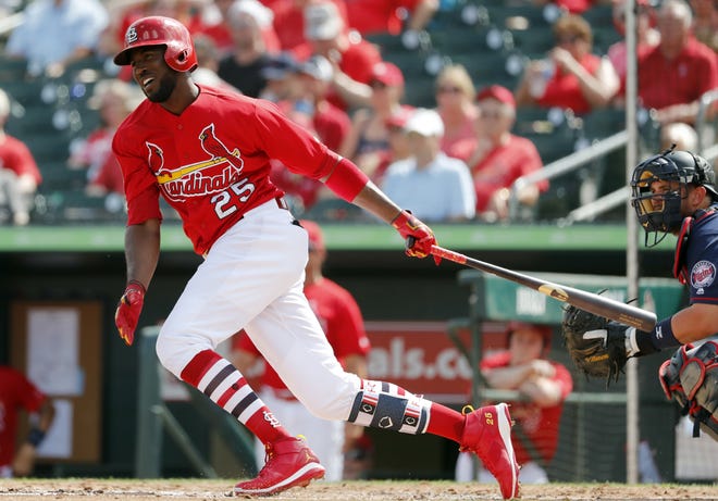 St. Louis Cardinals outfielder Dexter Fowler grounds out during the third inning of an exhibition spring training baseball game against the Minnesota Twins on Thursday, March 1 in Jupiter, Fla. Fowler is back in the leadoff spot of the Cardinals' batting order. [Jeff Roberson/The Associated Press]