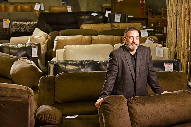 Chris Caprio, president of Ashley HomeStore, is photographed in the warehouse of the regional corporate offices Feb. 13 in Jacksonville. [Will Dickey/Florida Times-Union]