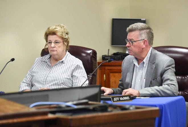 Okaloosa County School District Superintendent Mary Beth Jackson listens as school board attorney Jeff McInnis talks to the board about the agreement they reached Friday morning to settle a racial harassment case filed in 2016 by the parents of two black students attending Baker School.

[DEVON RAVINE/DAILY NEWS]