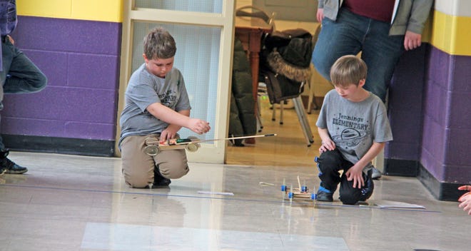 Students from Jennings Elementary School in Quincy compete in the Mousetrap Vehicle event Saturday during Science Olympiad. CHRISTY HART-HARRIS PHOTO