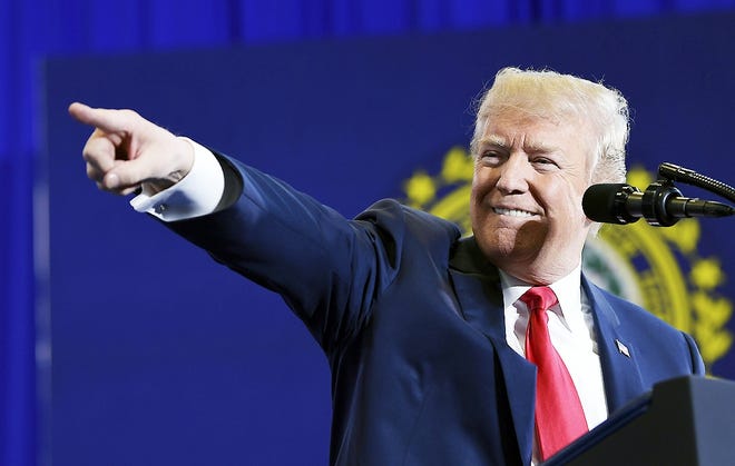 President Donald Trump speaks at Manchester Community College in Manchester, N.H., Monday. Trump was in New Hampshire to unveil more of his plan to combat the nation's opioid crisis. [SUSAN WALSH/ASSOCIATED PRESS]