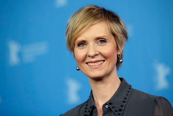 FILE - In this Sunday, Feb. 14, 2016, file photo, Actress Cynthia Nixon poses for the photographers during a photo call for the film 'A Quiet Passion' at the 2016 Berlinale Film Festival in Berlin, Germany. The former "Sex and the City" star says she'll challenge Gov. Andrew Cuomo in New York's Democratic primary in September. Her announcement Monday, March 19, 2018, sets up a race pitting an openly gay liberal activist against a two-term incumbent with a $30 million war chest and possible presidential ambitions. (AP Photo/Michael Sohn, File)