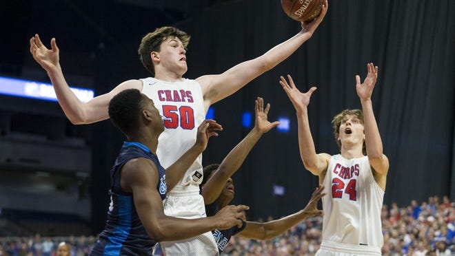 Westlake’s Will Baker (50) and Matthew Mayer (24) reach for the rebound over Allen’s Jaylon Scott (20) during a UIL Class 6A boys high school state semifinal basketball game at the Alamodome in San Antonio, Friday, March 9, 2018. (Stephen Spillman)