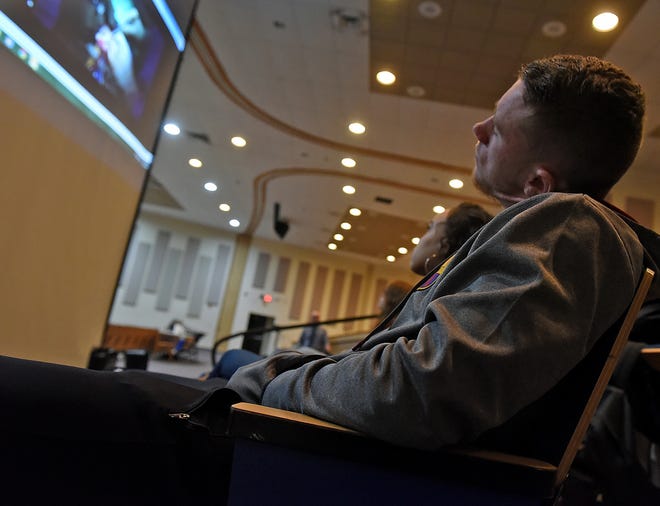 Tiernan Johnson, 16, a student at Pemberton Township High School, watches a video broadcast of an open heart surgery at Deborah Heart and Lung Center in Pemberton Township on Tuesday. [NANCY ROKOS / STAFF PHOTOJOURNALIST]