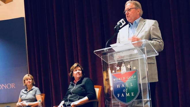 World Golf Hall of Fame members Beth Daniel (left) and Meg Mallon (right) are introduced by Hall of Fame president Jack Peter during their appearance on Tuesday as part of the Hall's Speaker Series. [Garry Smits/The Times-Union].