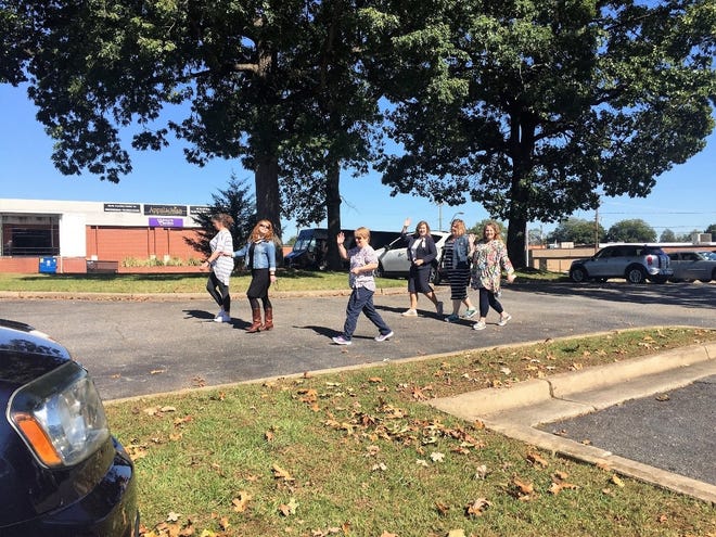 Employees on a Walk ‘N’ Talk Around Campus at Partners Behavioral Health Management [PROVIDED PHOTO]
