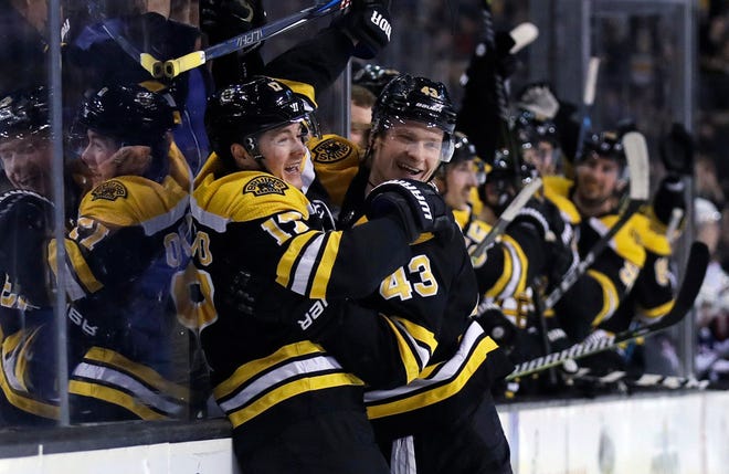 Ryan Donato, left, is congatulated by Danton Heinen after his Donato's goal on Monday night.