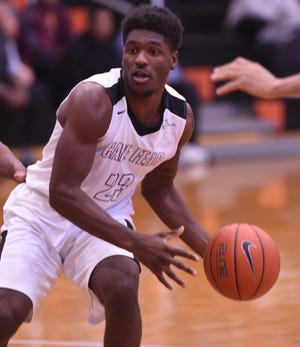 Donte Tatum and the Cape Fear Community College men's basketball team fell 84-60 in their opening round matchup with Hutchinson CC at the NJCAA Division I tournament. [Ken Blevins/StarNews]