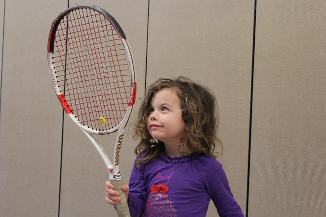 Vivian Benard, 4 , of Hingham getting ready to play some tennis at the Rec. [Courtesy Photo]
