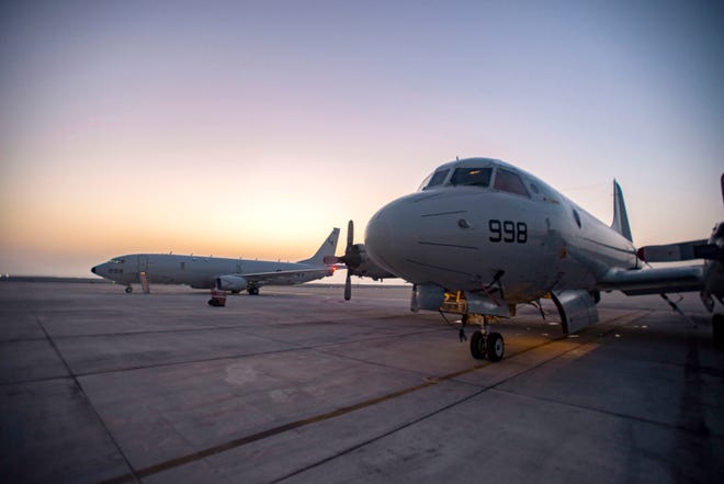 Photo courtesy of VP-5
A P-8A Poseidon (left) from Patrol Squadron (VP) 5 sits next to P-3 Orion assigned to VP-40, on the flight line. The "Mad Foxes" of VP-5, detached from Commander, Task Force (CTF) 67 to CTF 57, are supporting missions in U.S. 5th Fleet to demonstrate cross-combatant command interoperability, deter potential adversaries and to provide large-scale intelligence, surveillance and reconnaissance collection.