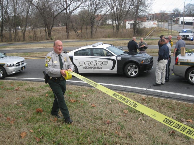 Gastonia and Gaston County Police investigate a homicide scene in this 2013 file photo.