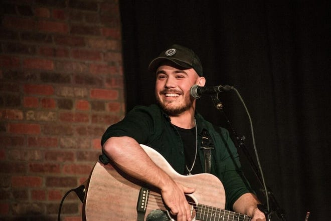 Trent Glisson at a recent performance at The Listening Room Cafe in Nashville, Tennessee. The Gastonia native will perform 9:30 p.m. Friday at Freeman's Pub at 173 W. Main Ave., Gastonia. [PHOTO BY KELSEY PAGE PHOTOGRAPHY/SPECIAL TO THE GAZETTE]